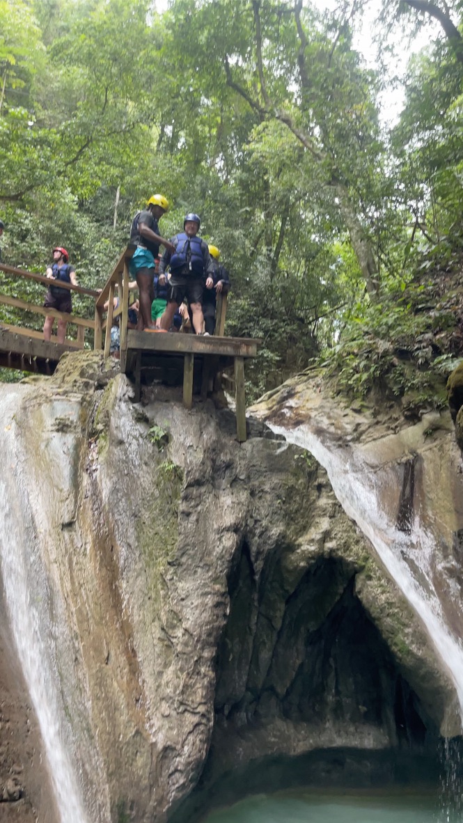 Swimming in waterfall pool Dominican Republic